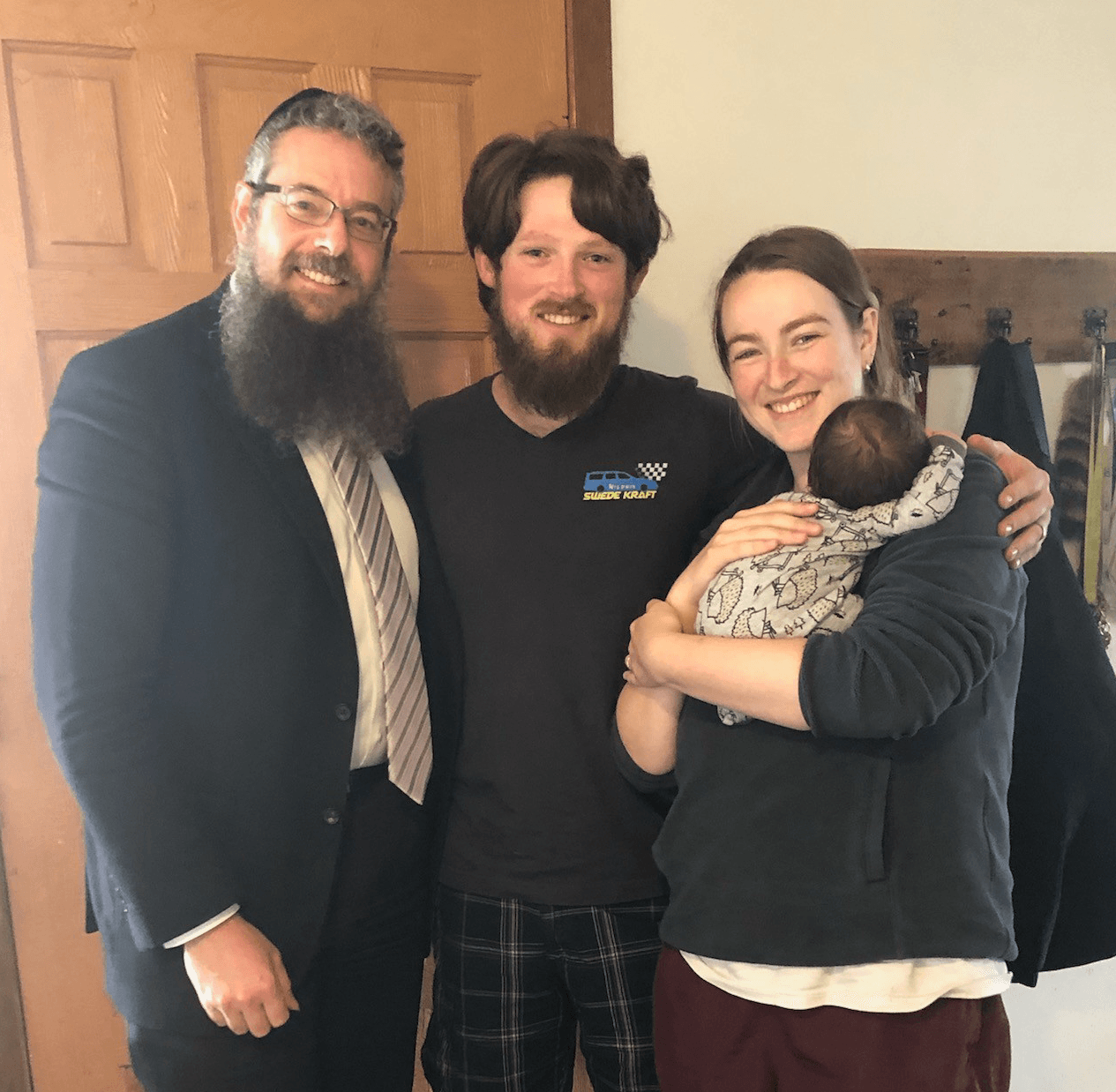 Rav Weisman with a young family